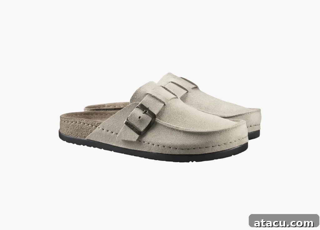The Best Slippers for a Cozy Winter at Home 3 Simba ROK leather moccasin style reflexology slippers for ultimate foot comfort