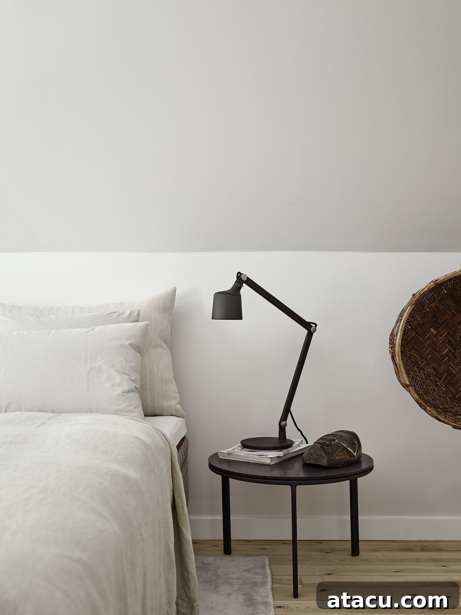 Vipp Farmhouse modern bedroom interior with a sleek bedframe and minimalist decor