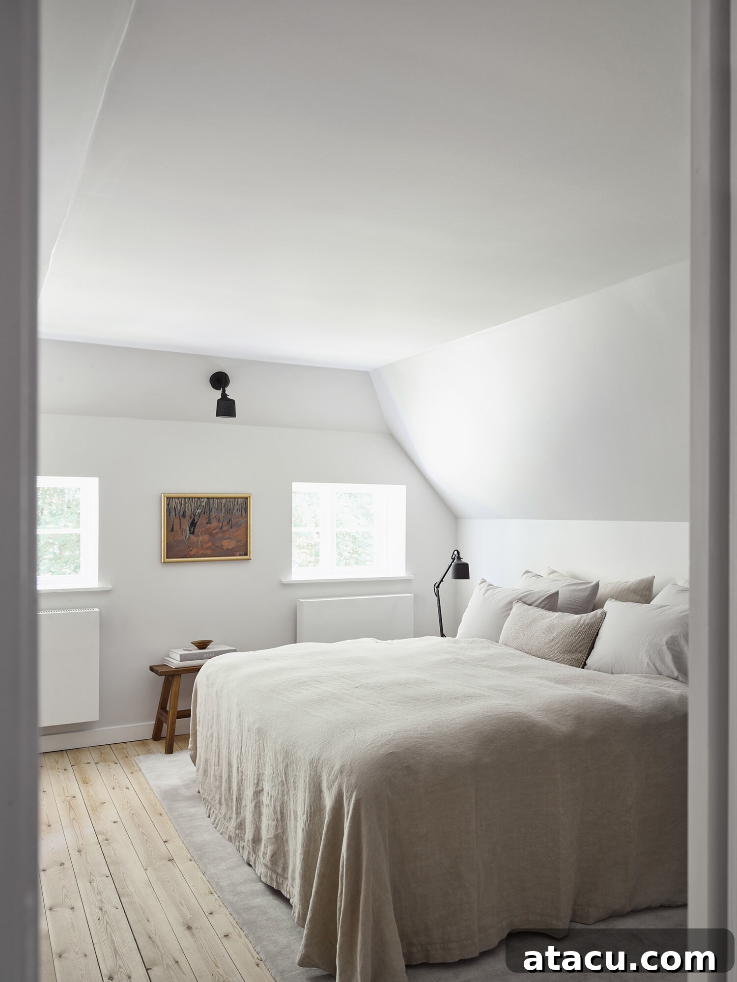 Vipp Farmhouse elegant bedroom with Vipp furniture, highlighting functional Danish design