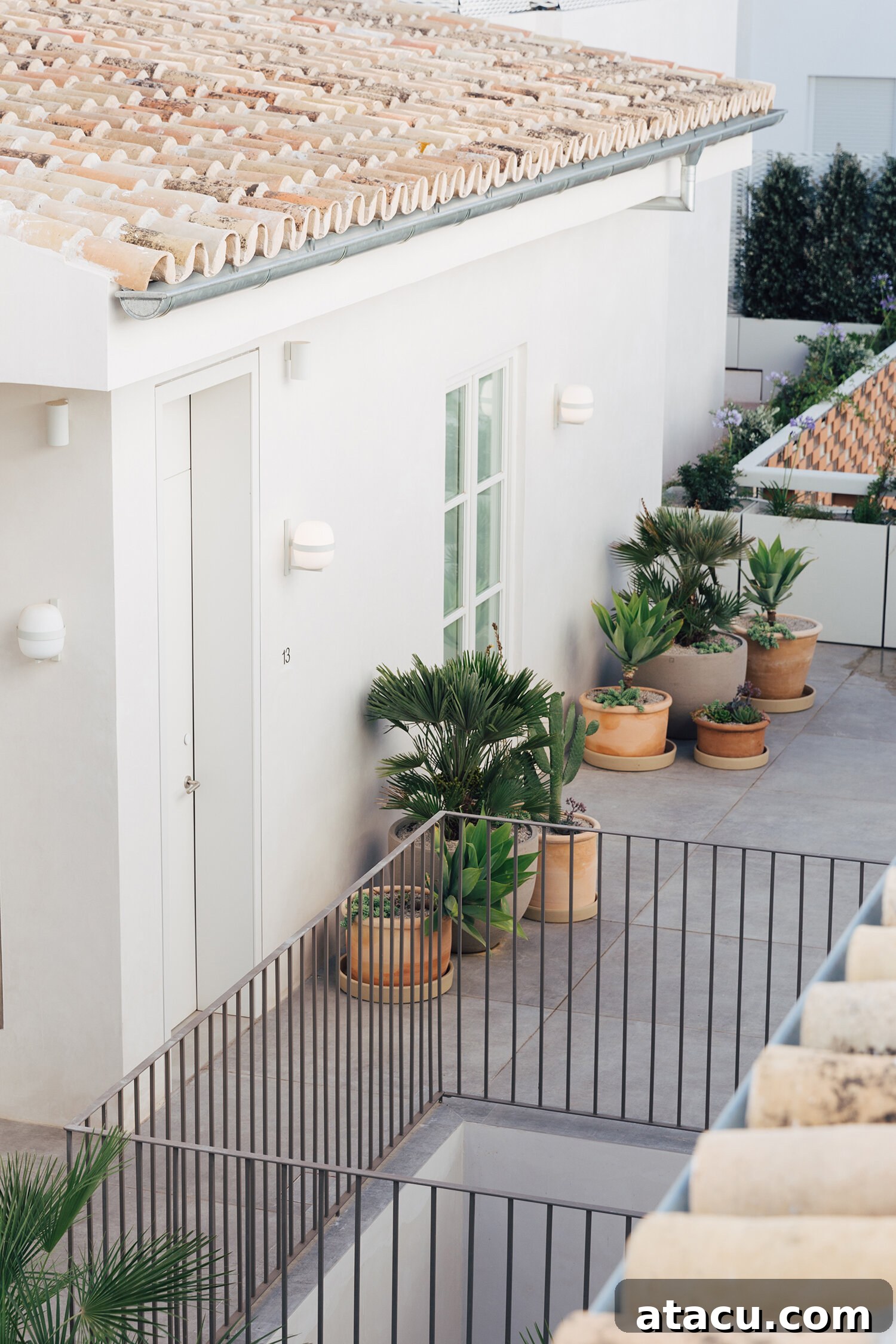 Ferm Living Desert chair on balcony at Plácido y Grata Seville