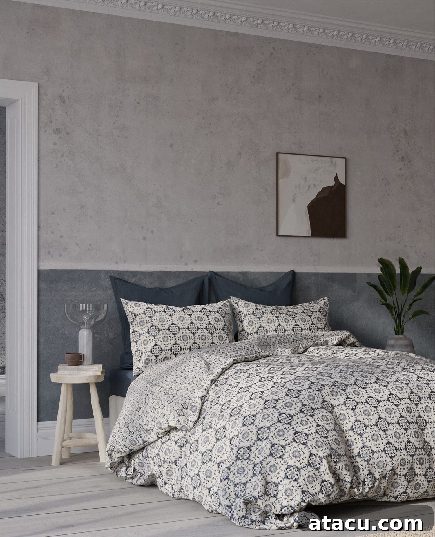 A bedroom with inky blue bed linen.