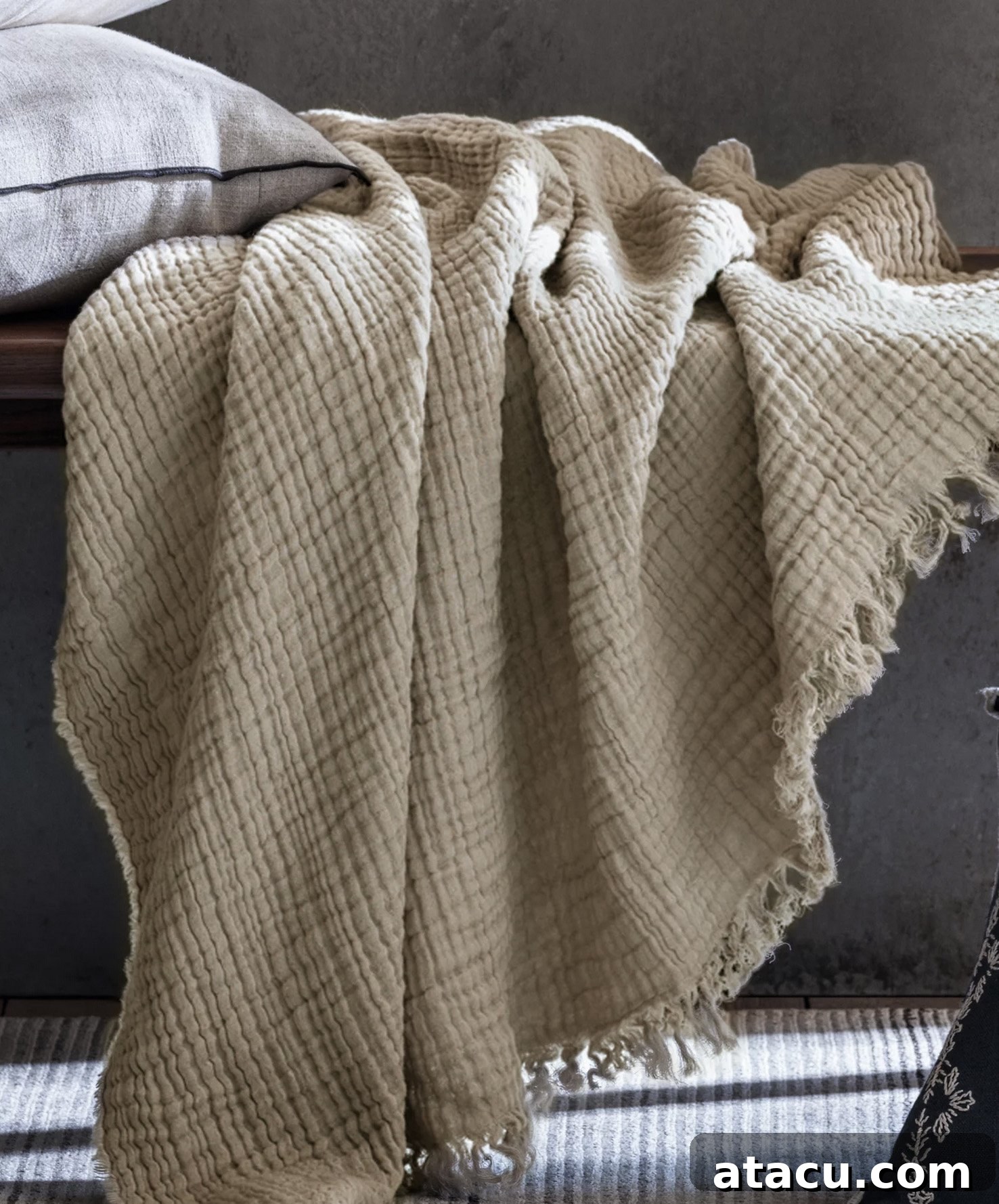 A beige linen throw
