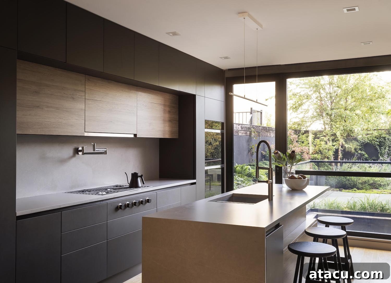 Wide shot of the elegant kitchen, highlighting its functional layout and natural material palette.