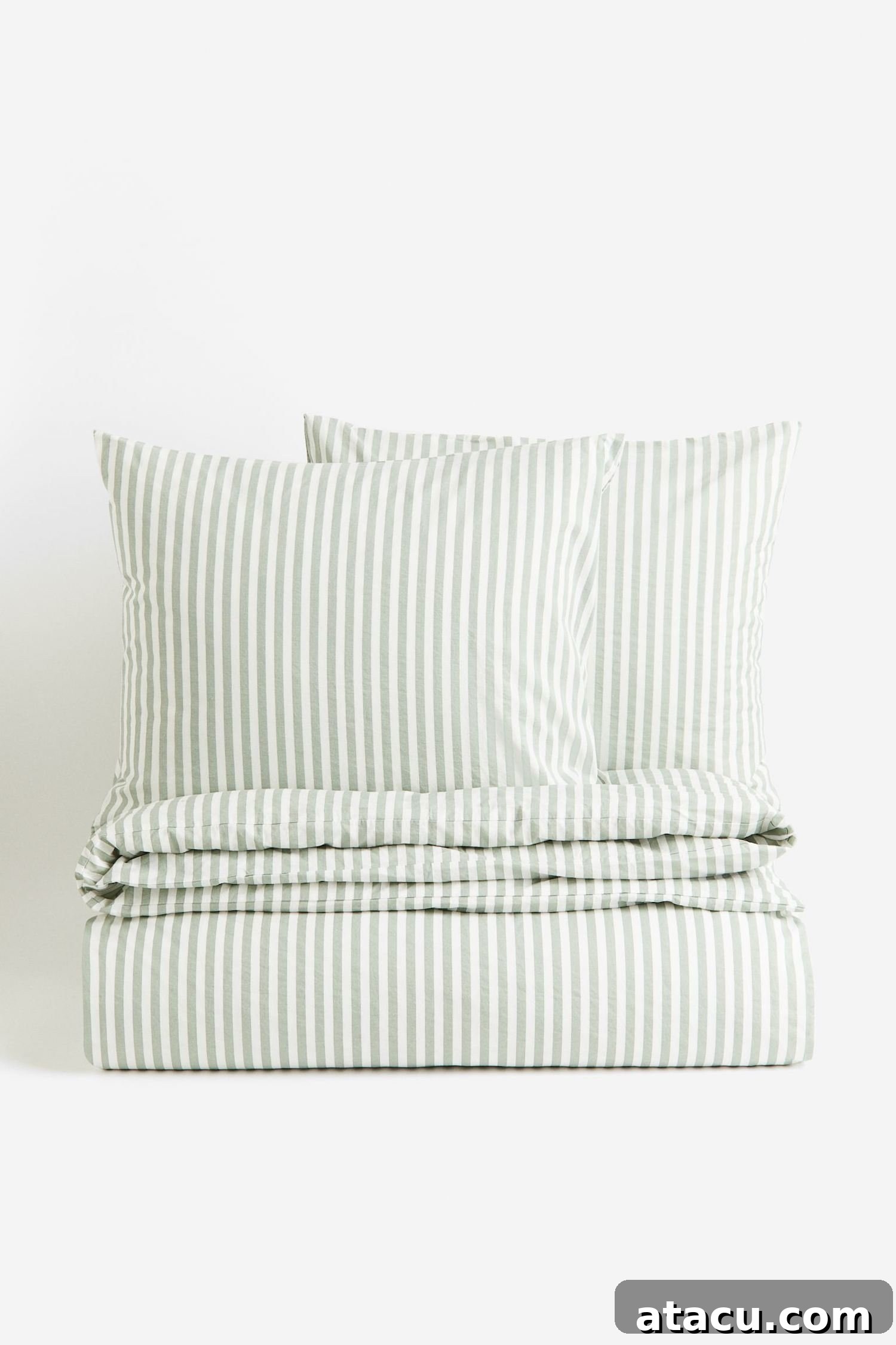 H&M Home Green and White Striped Cotton Bed Linen for a serene bedroom