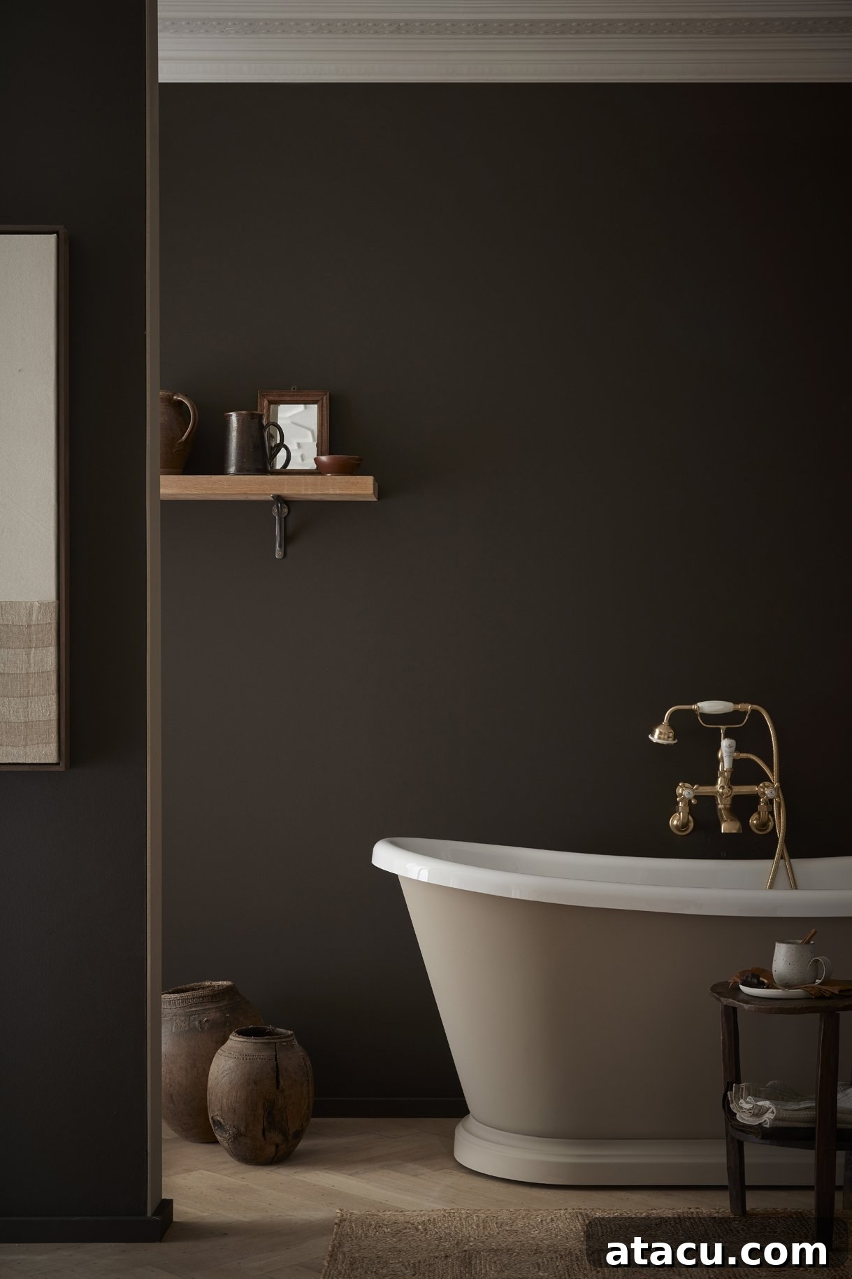 A luxurious bathroom with walls in Little Greene Chocolate Colour, a rich, intense brown, beautifully paired with a bath in Rolling Fog – Dark for a cohesive look.