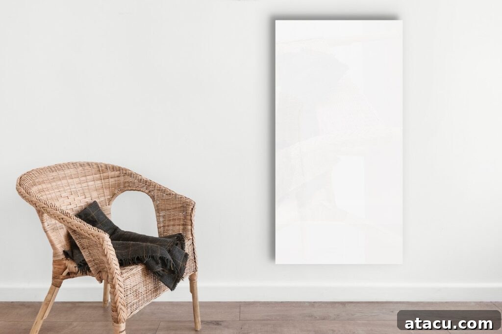 A white minimalist living space with a rattan chair and a sleek white infrared hearing panel.