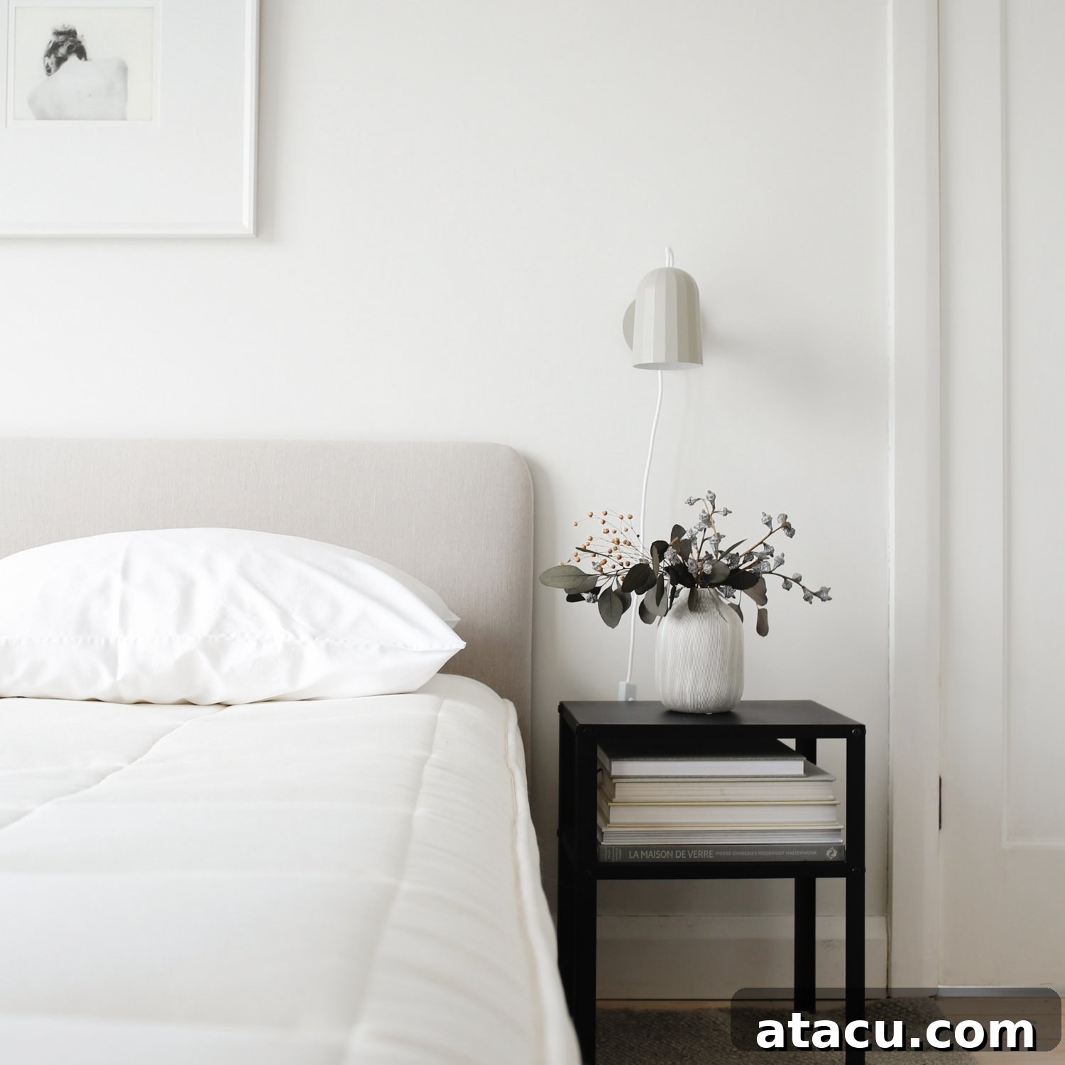 A beautifully made bed with a fresh mattress
