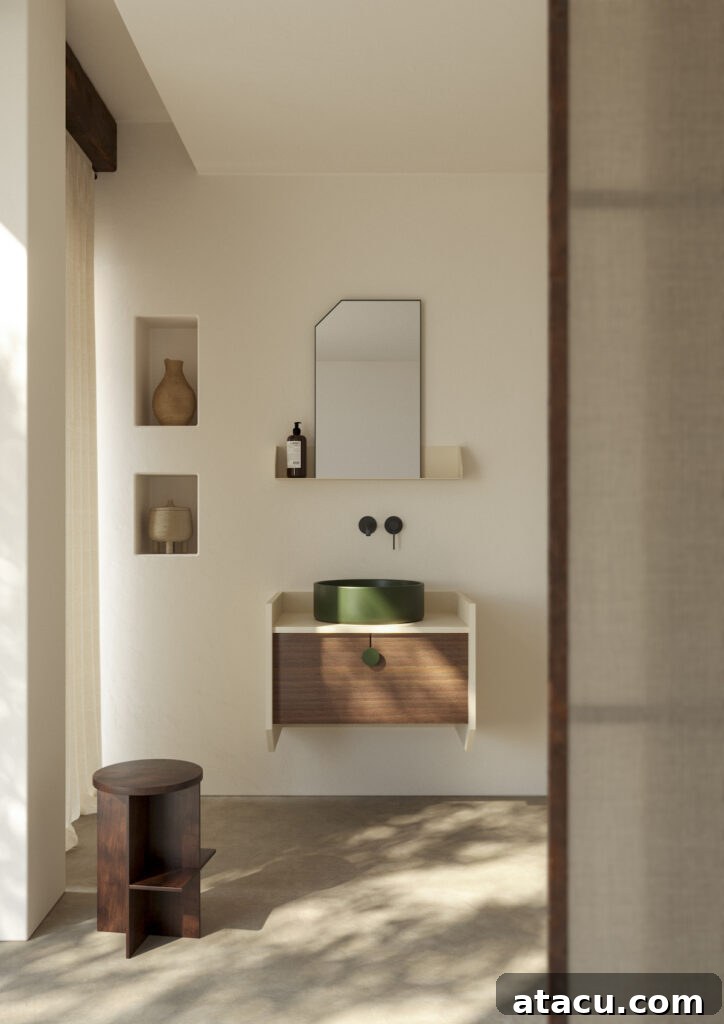 A stylish modern bathroom featuring a subtle grey coloured bathroom sink and elegant fixtures.