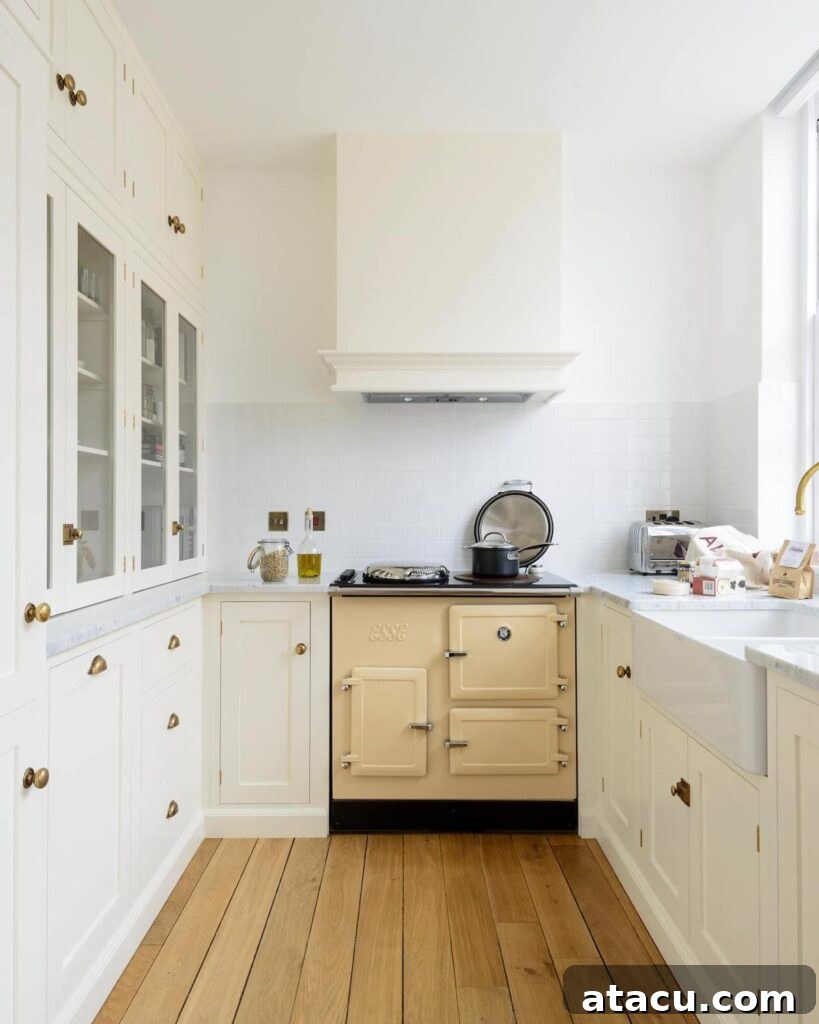 A cream Shaker style kitchen with a range cooker.