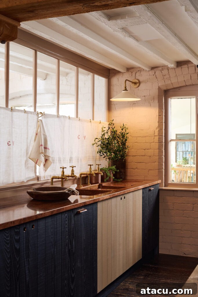 Stunning copper countertops creating a focal point in a modern rustic kitchen.