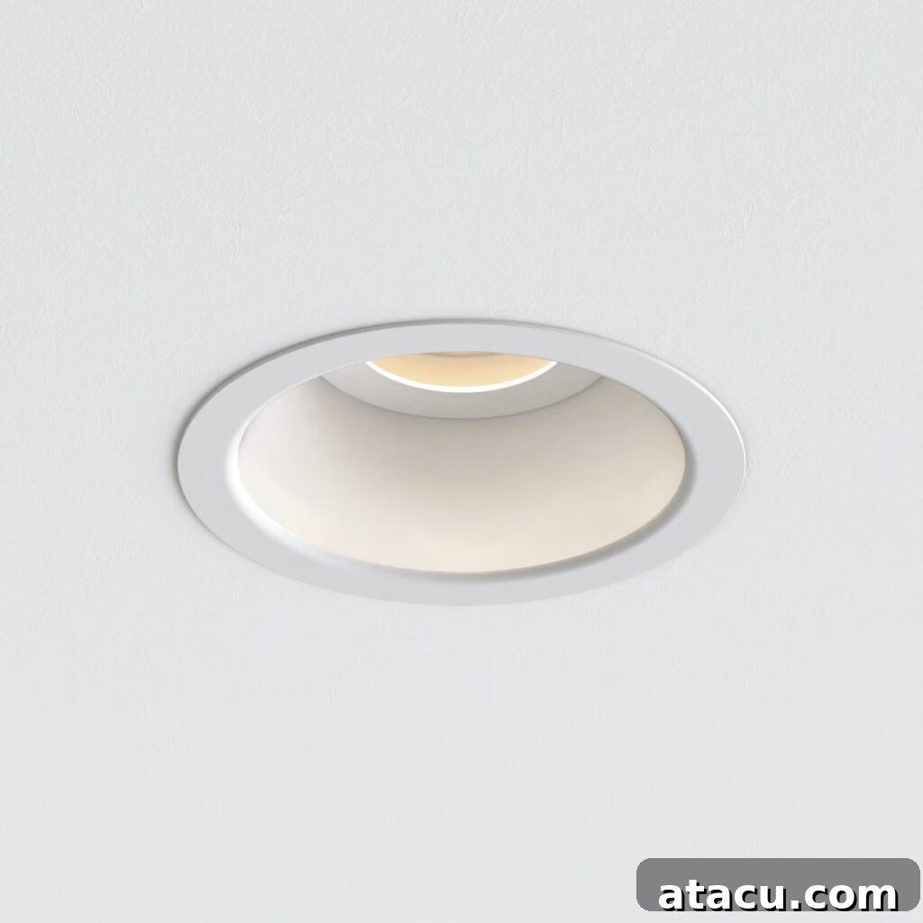 Transform Your Hallways: Inspiring Lighting Ideas for a Radiant Home 12 Recessed downlights by Astro, creating a sleek and modern, uniformly illuminated hallway.