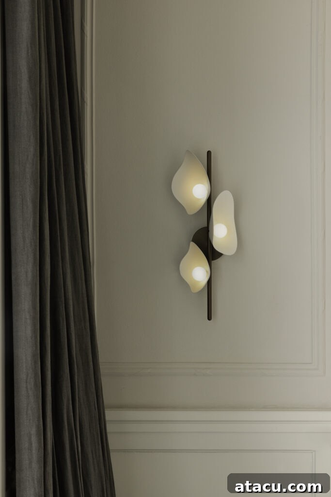 Transform Your Hallways: Inspiring Lighting Ideas for a Radiant Home 8 Bronze wall light by Nuura, an elegant wall lamp adding tranquility and harmony to a modern hallway.
