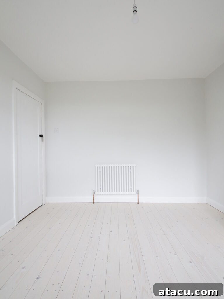 Farrow and Ball Strong White freshly painted walls in a modern interior