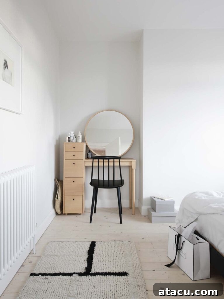 Farrow and Ball Strong White paint in a serene bedroom setting with natural light