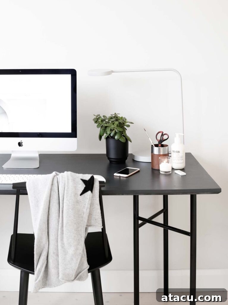Farrow and Ball Strong White office interior design with sleek furniture