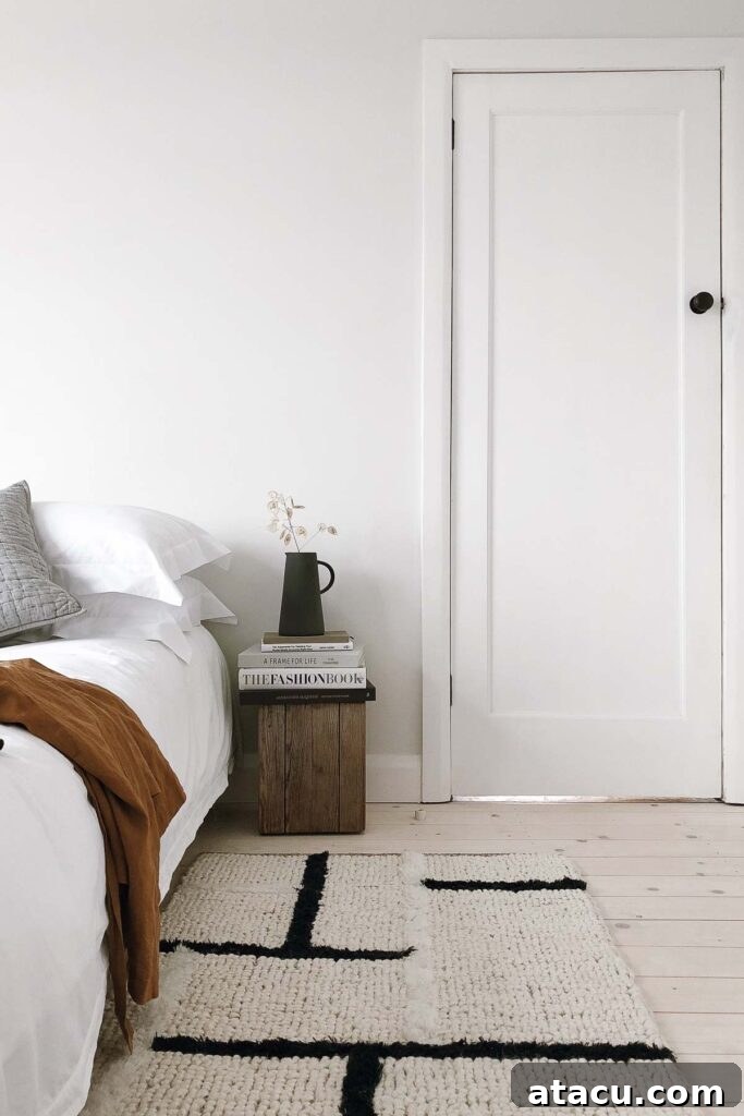 Farrow and Ball Strong White bedroom decor with elegant furnishings