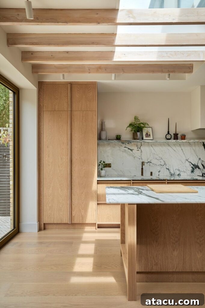 A Victorian townhouse with a bespoke Scandinavian kitchen, showcasing an elegant fusion of styles.