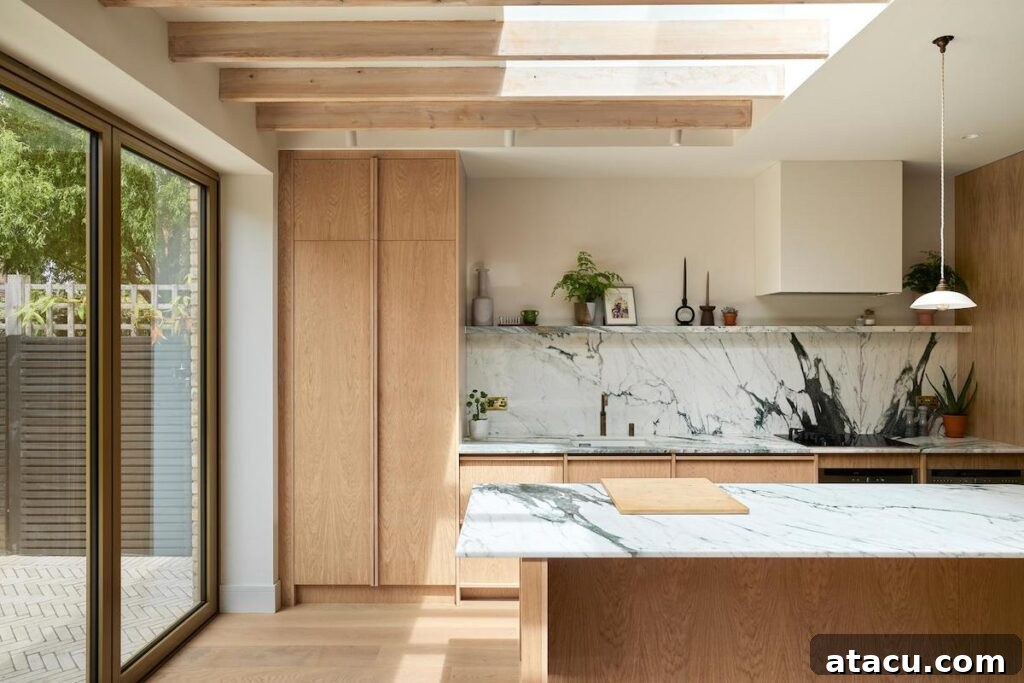 Close-up of the bespoke Scandinavian kitchen featuring a stunning marble countertop.
