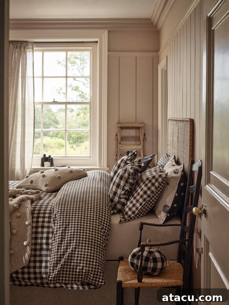A country cottage style bedroom with wood panelling gingham bed linen designed by Stacey Solomon for George Home at Asda.