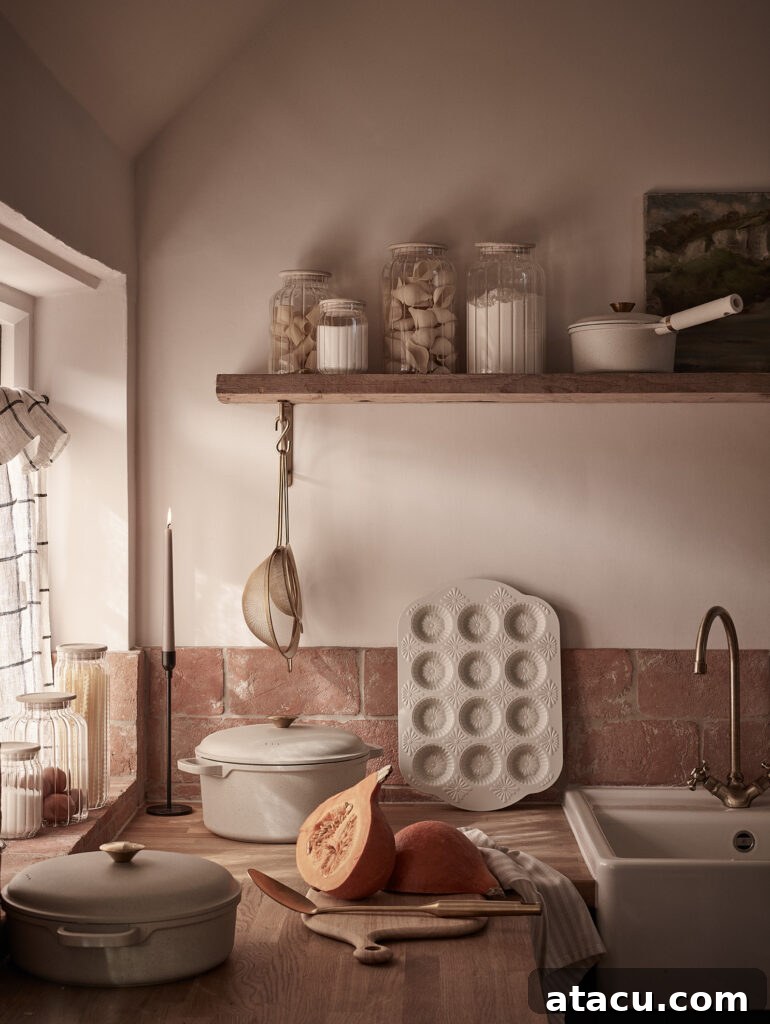 Homeware pieces from the Stacey Solomon Asda collection in a country farmhouse style kitchen with terracotta tiles and oak worktops.