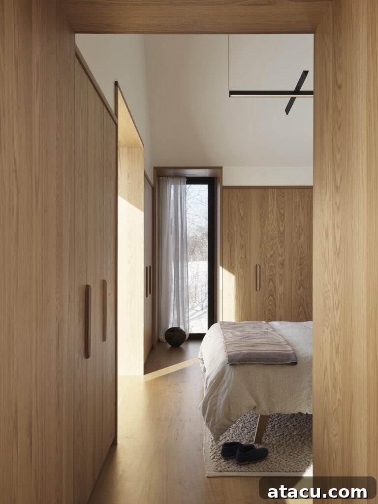 A modern minimalist oak bedroom in a contemporary home.
