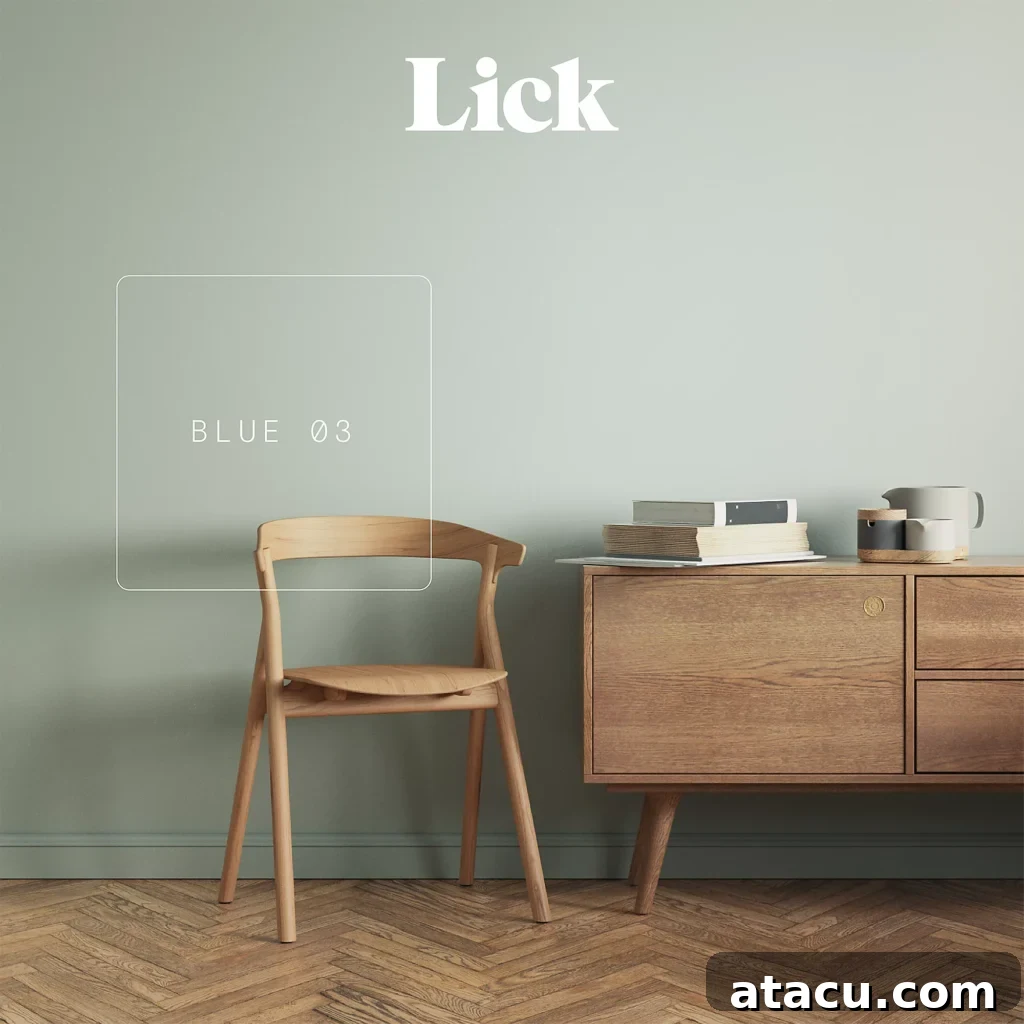 Curated Duck Egg Blue Paint Colors by Top Brands 2 Interior with Lick Blue 03 duck egg blue wall, wooden chair, and mid-century sideboard, showcasing a sophisticated, muted blue perfect for modern homes.