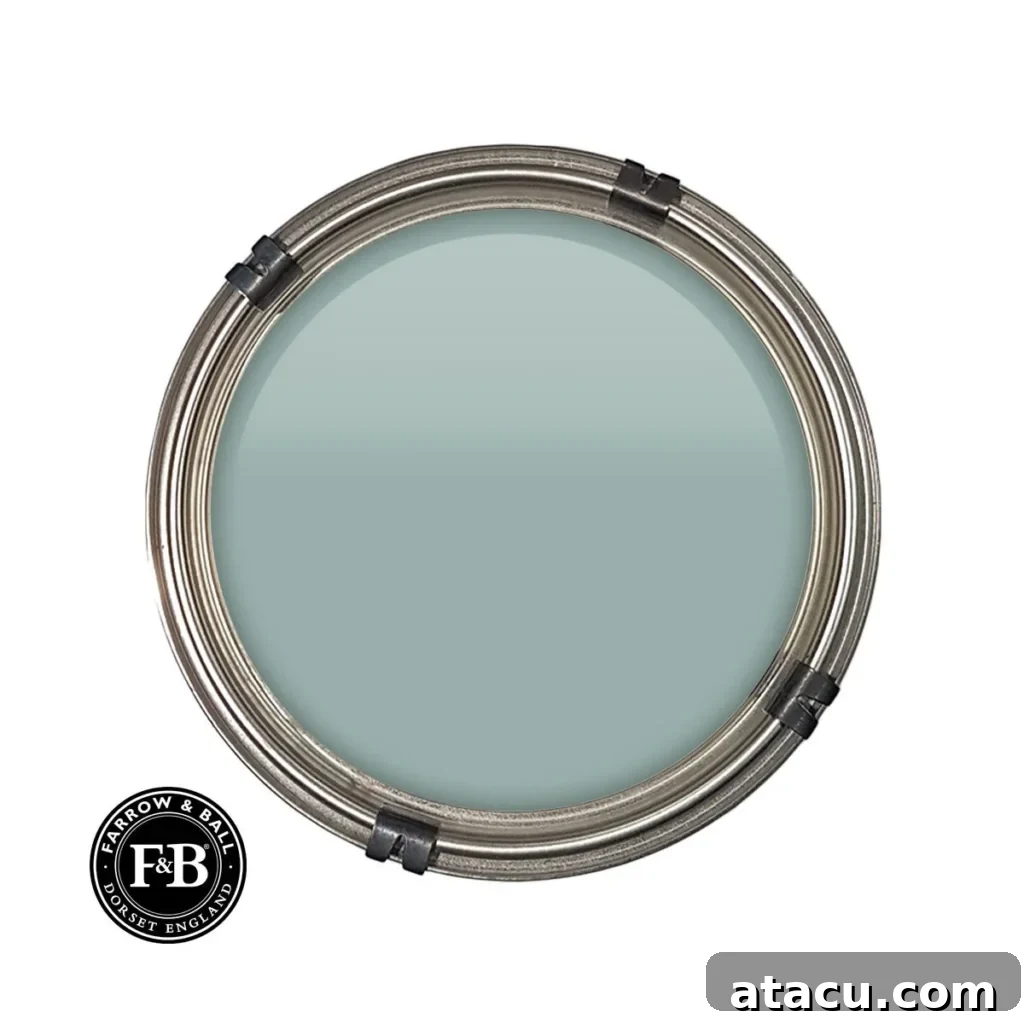 Curated Duck Egg Blue Paint Colors by Top Brands 9 Farrow & Ball Dix Blue paint swatch, a muted blue-green shade with a vintage-inspired tone, perfect for elegant interiors and depth.