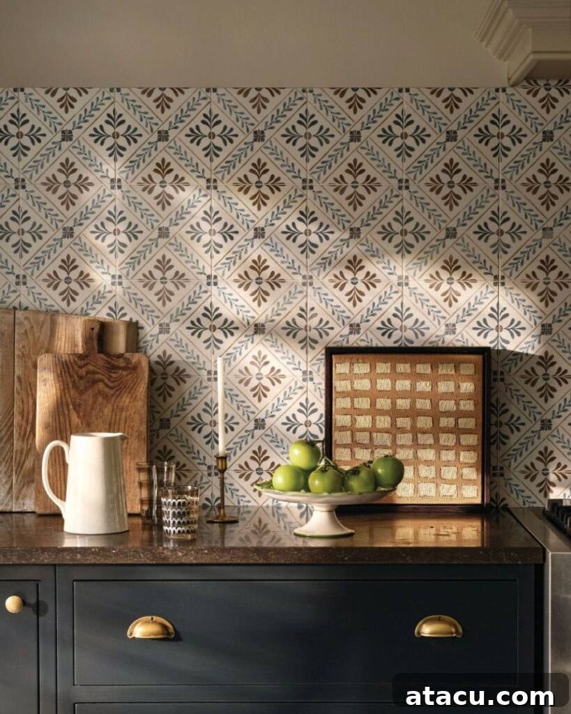 Close up of a kitchen featuring Goa tiles from the Fired Earth Nina Campbell tile collection.
