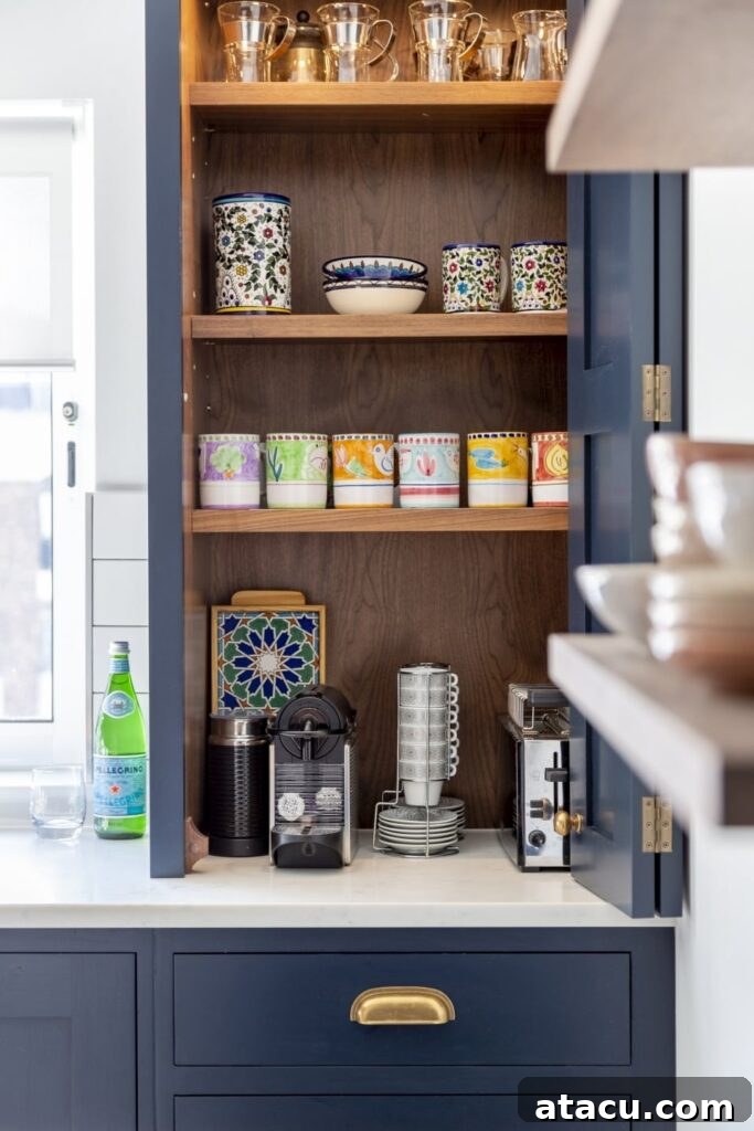 Vibrant navy blue coffee station featuring colorful ceramic mugs, an espresso machine, and wooden shelves displaying playful pottery.