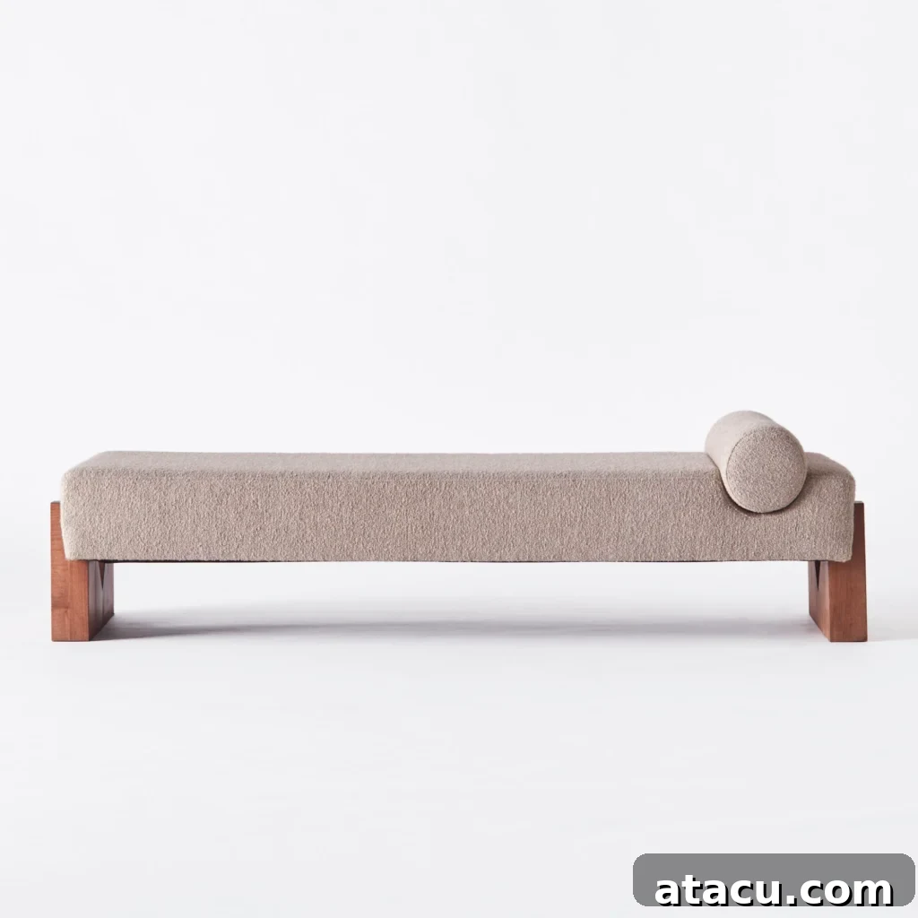 Close-up of a luxurious bouclé daybed, highlighting its tactile fabric and comfortable design.