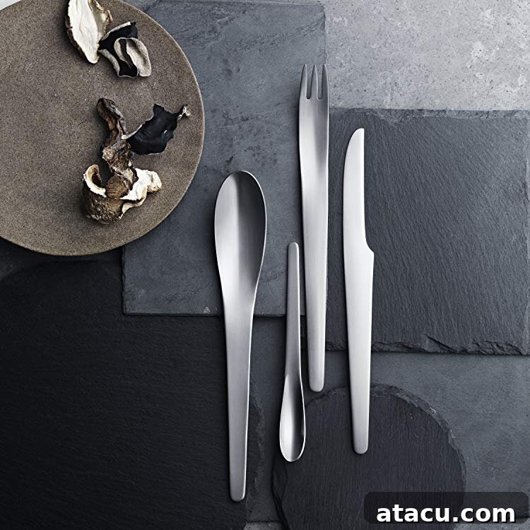Matt stainless steel cutlery set by Arne Jacobsen