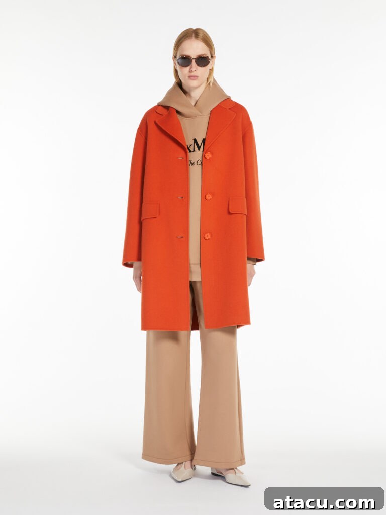 Orange wool cocoon coat by Max Mara.