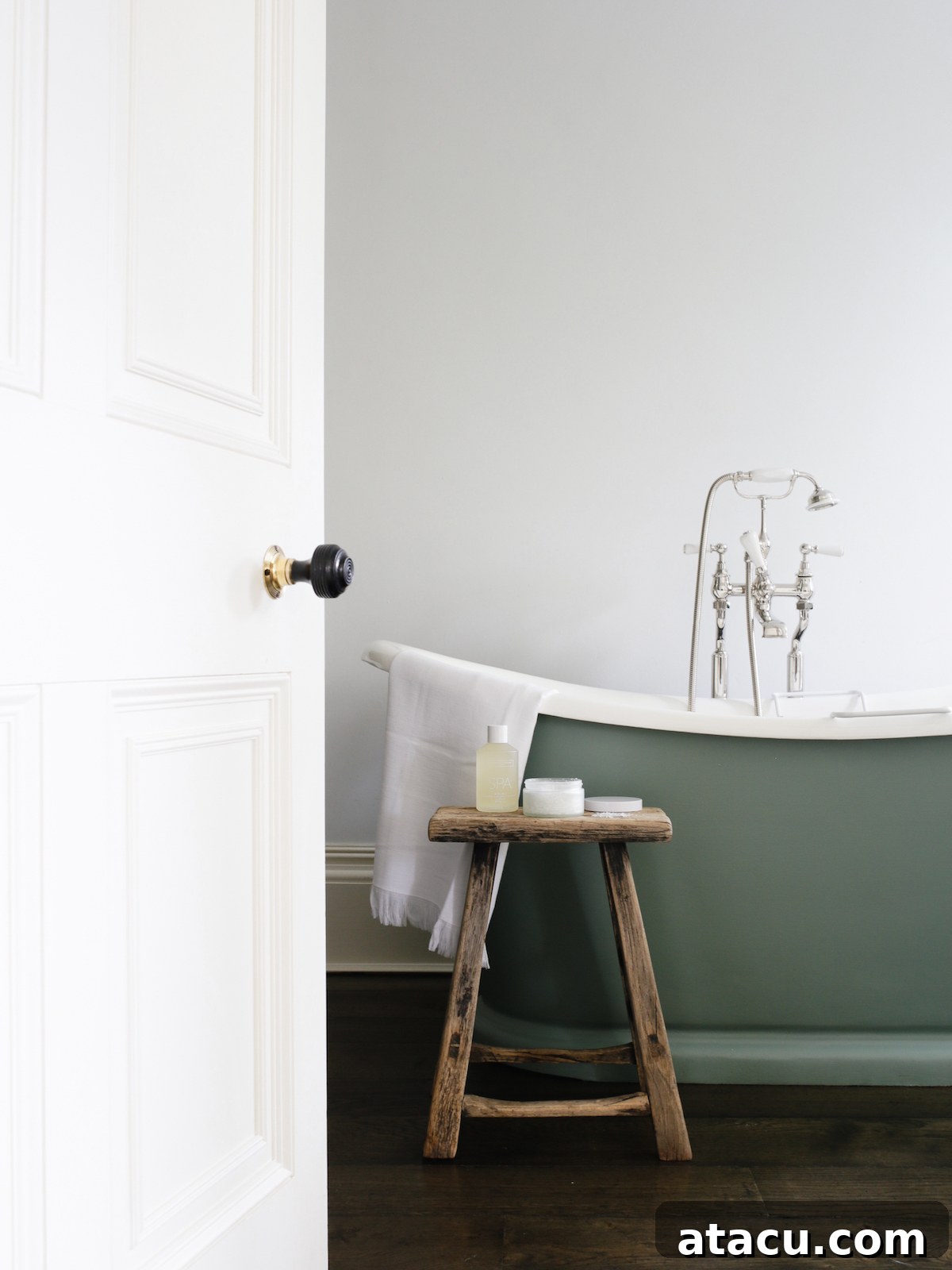 A luxury hotel bathroom with a freestanding bath tub