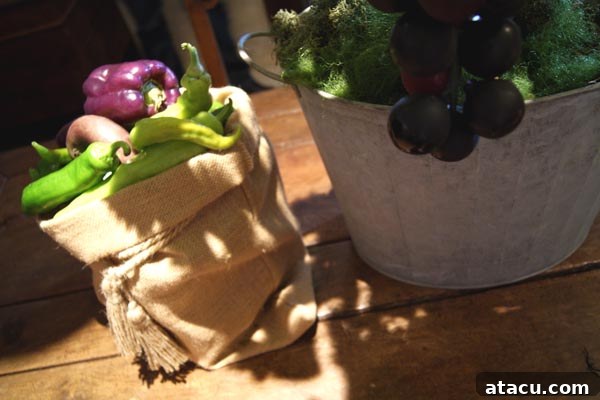 A rustic display of fresh vegetables, likely from the potager garden, in Chenonceau's historic kitchen.