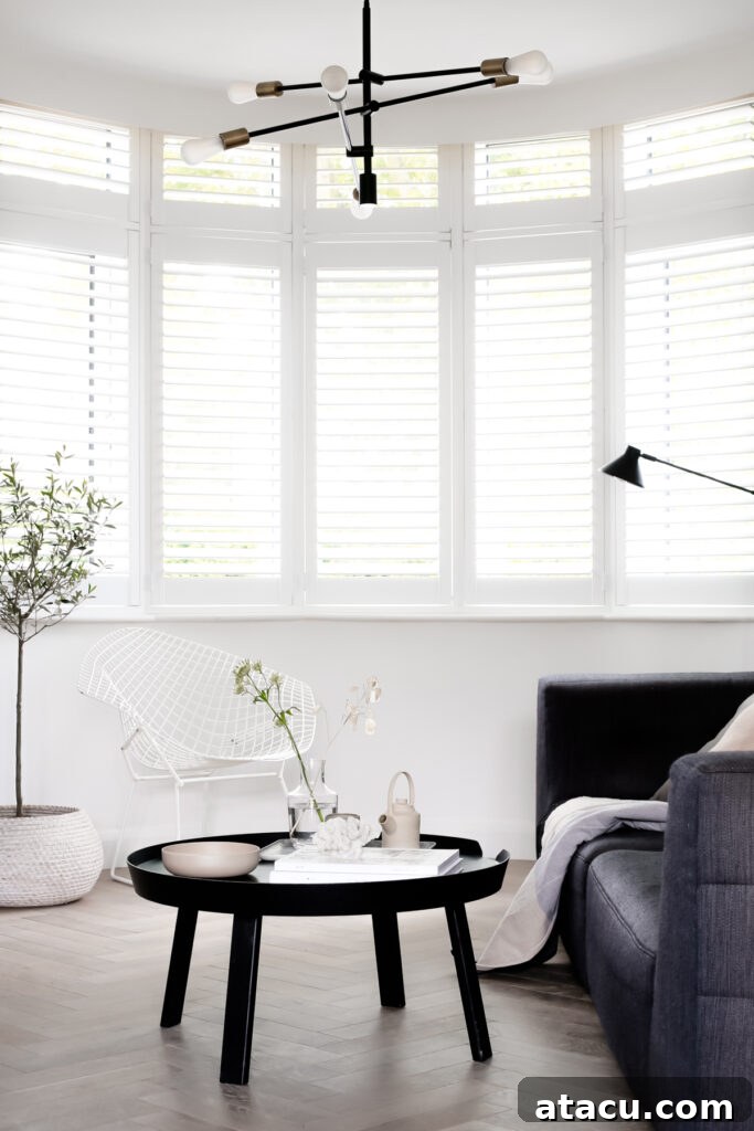 Bay window shutters in 1 1930s home